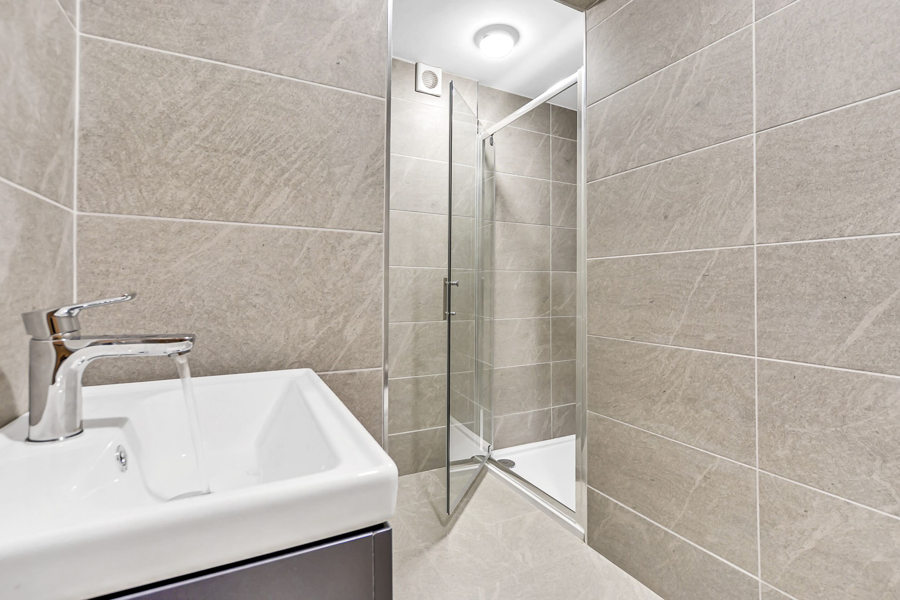 Shower, towels, soap, toilet paper