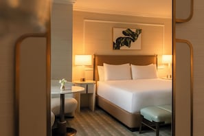 Premium bedding, down comforters, pillowtop beds, minibar