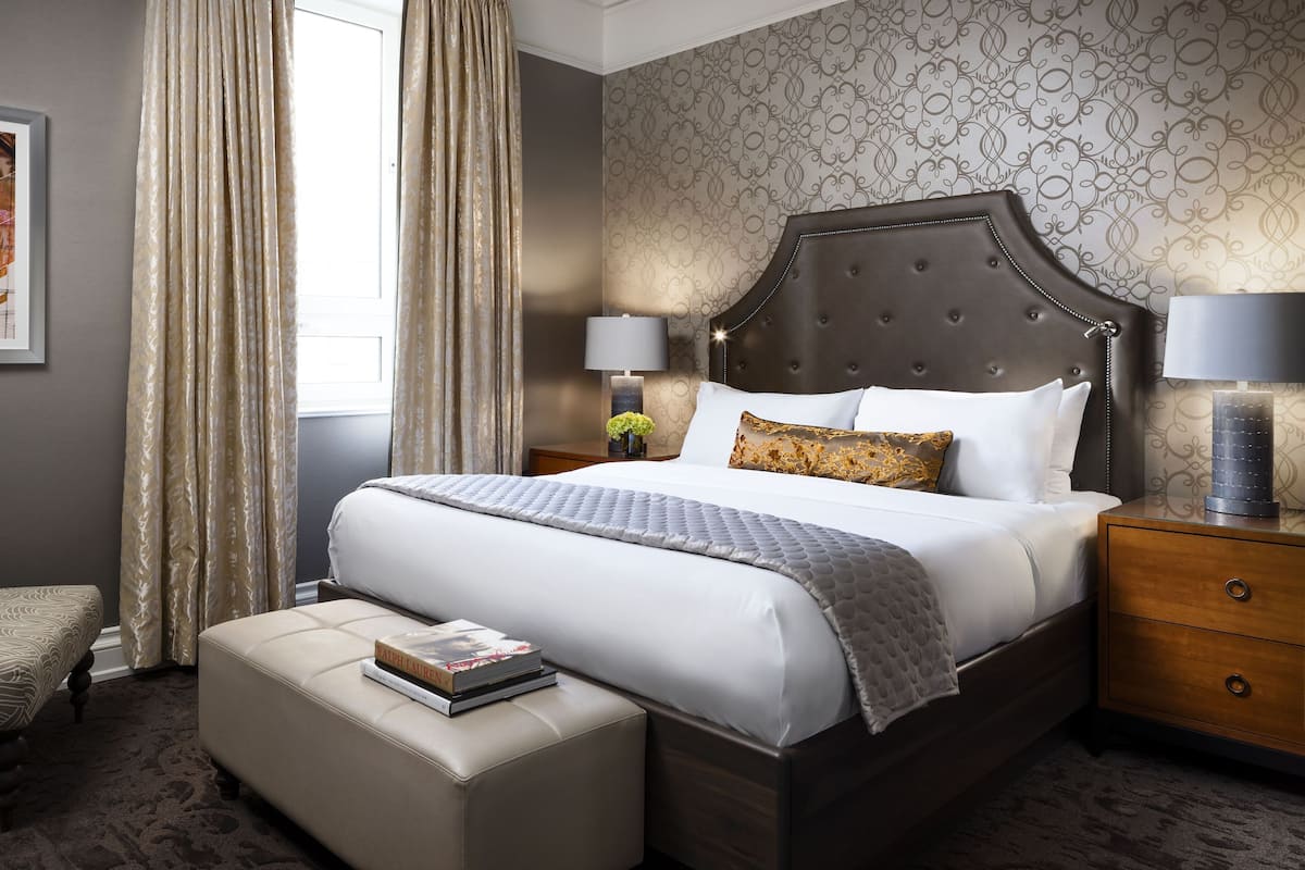 1 bedroom, hypo-allergenic bedding, down comforters, minibar