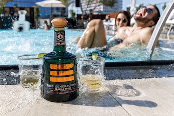 Outdoor pool, open 9:00 AM to 9:00 PM, pool umbrellas, sun loungers at Fairmont Century Plaza Gold Experience