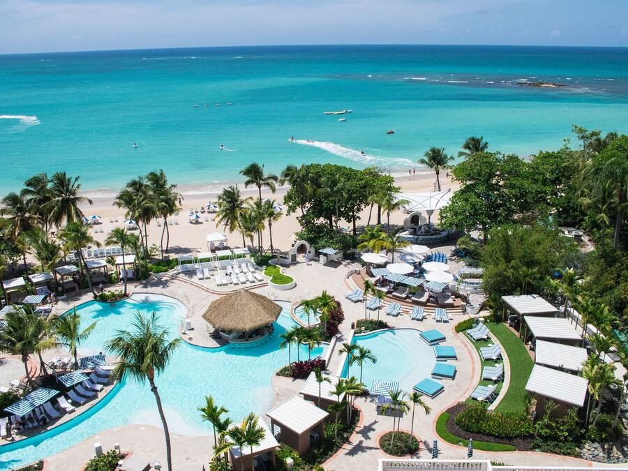 4 outdoor pools, open 7:00 AM to 9:00 PM, sun loungers