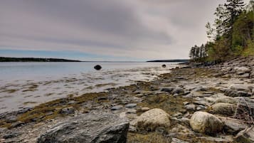 En la playa y toallas de playa