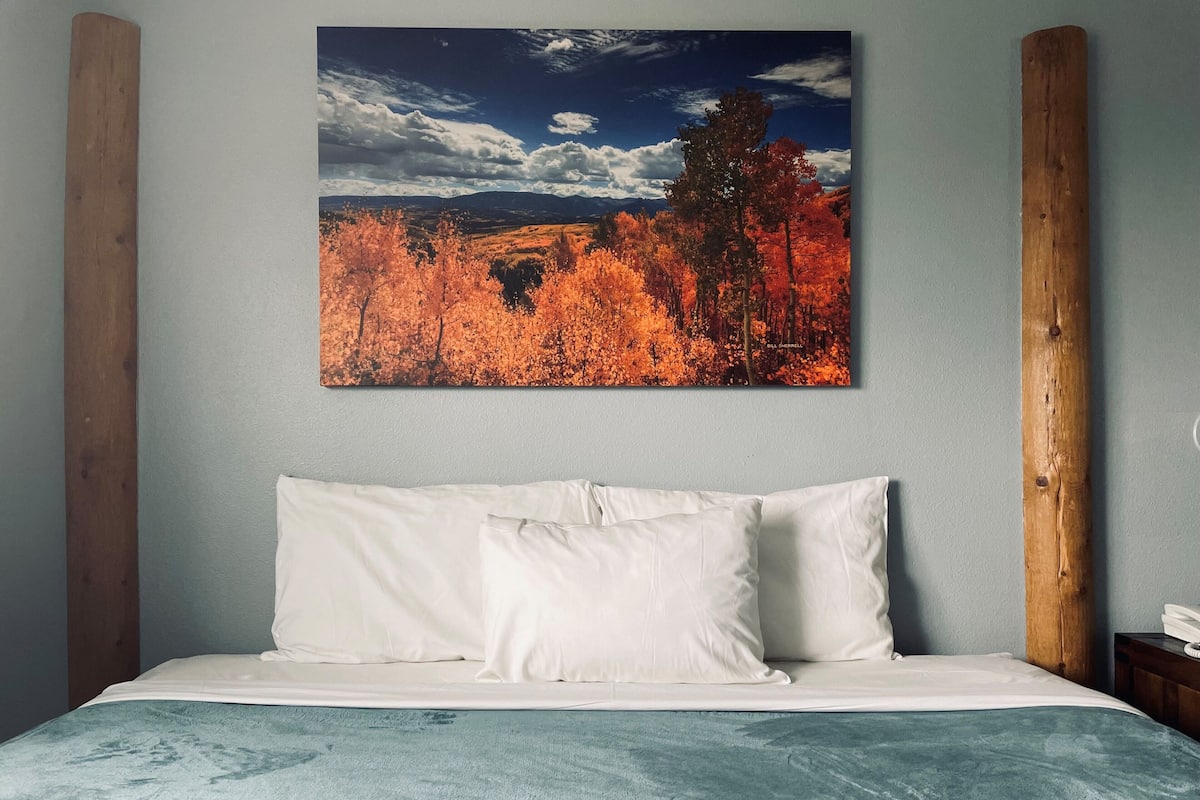 gold king mountain inn king bed | premium bedding, in-room safe, desk, iron/ironing board