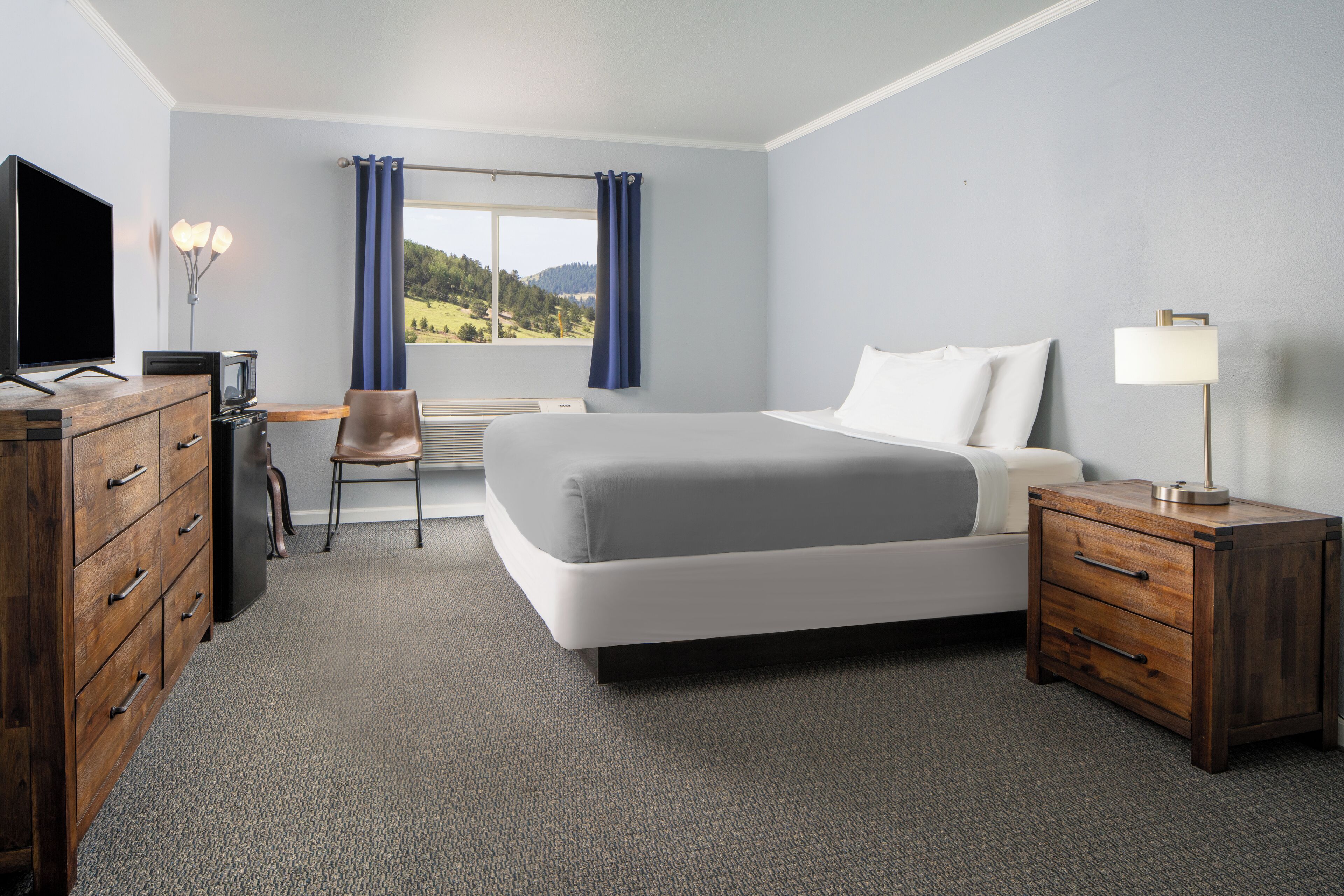gold king mountain inn king bed | premium bedding, in-room safe, desk, iron/ironing board