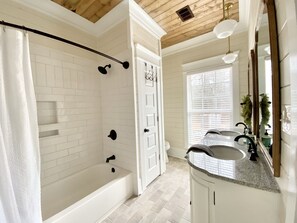 Combined shower/tub, hair dryer, towels, soap