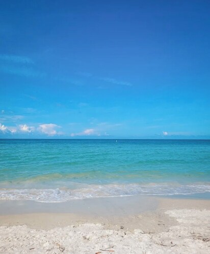 Sunset Beach Getaway – Steps to the Beach, Walk to Restaurants, Sleeps 8!