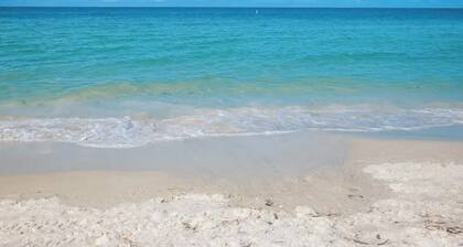 Sunset Beach Getaway – Steps to the Beach, Walk to Restaurants, Sleeps 8!