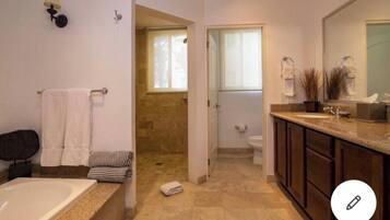 Combined shower/tub, towels, soap, shampoo