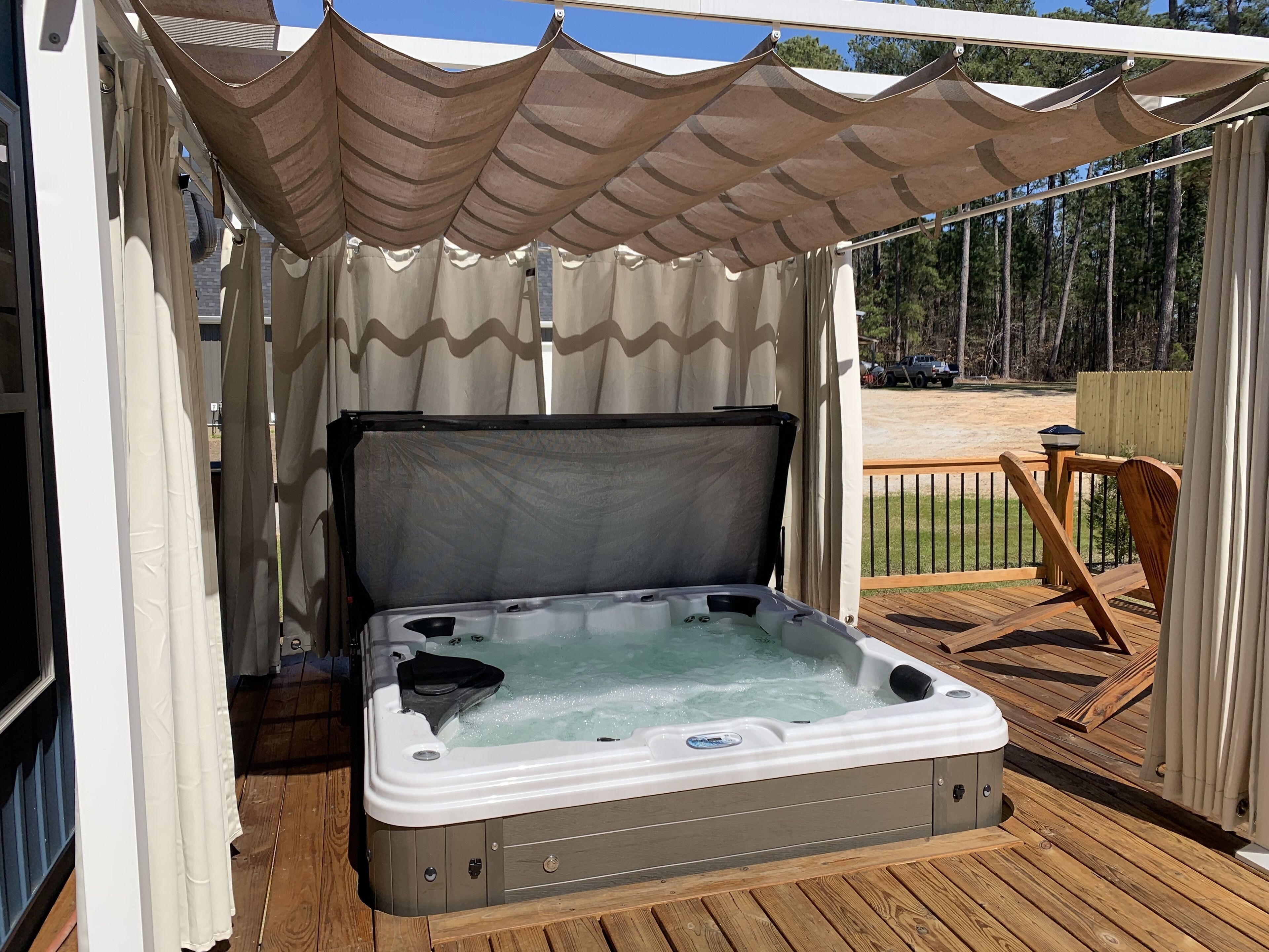 6 person hot tub.  Pull back the sun shade to enjoy the stars.