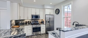 7 Bedroom, 3 parking spots,AC, Centrally located on Main Street next to Gondola!
