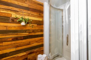 Combined shower/tub, hair dryer, towels, soap