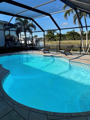 Outdoor pool, a heated pool - Tranquil Waterfront Pool home (Cape Coral)