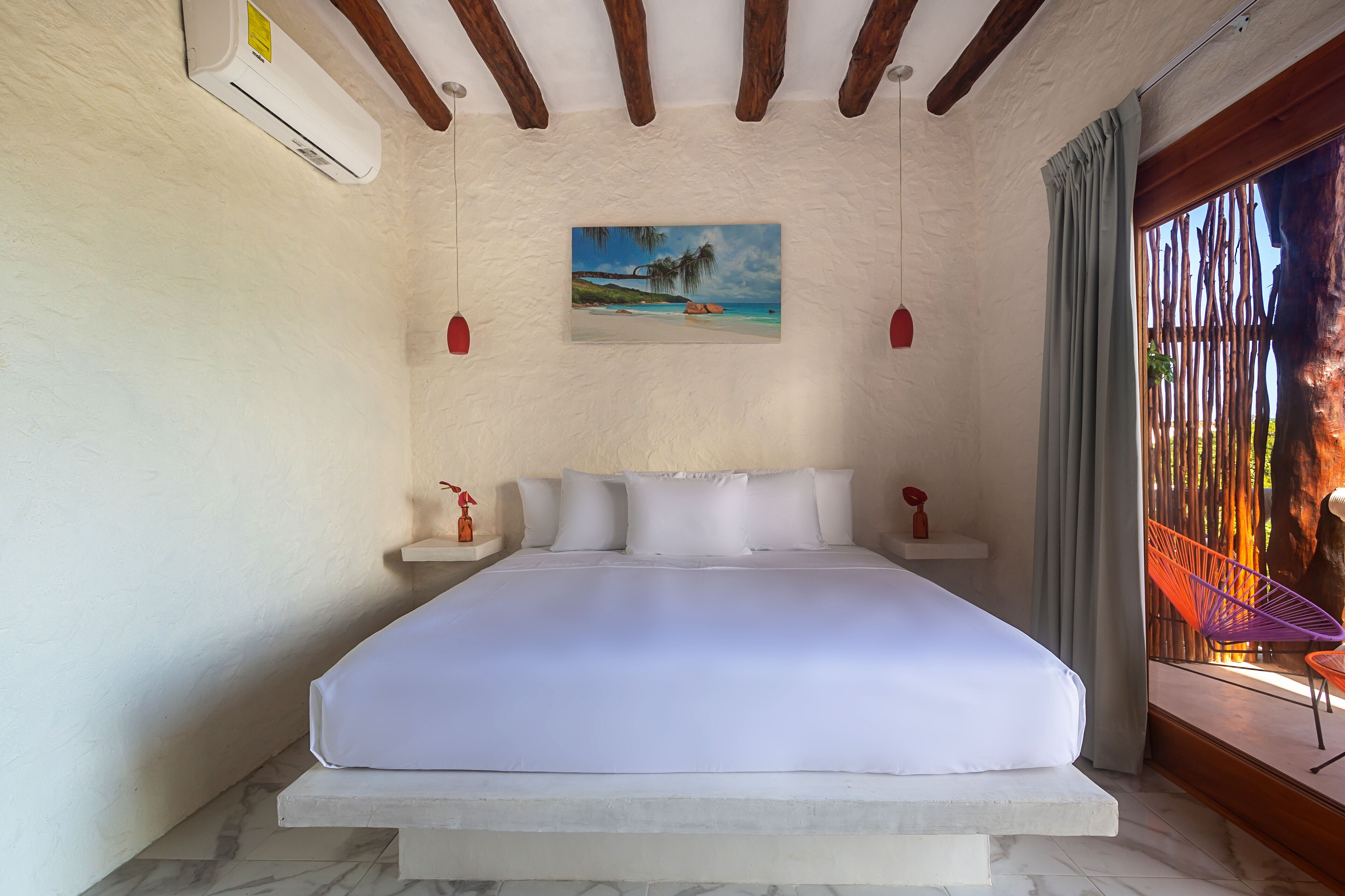 deluxe room, 1 king bed | premium bedding, minibar, in-room safe, individually decorated