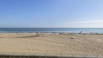 On the beach, sun loungers