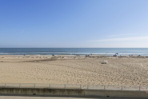 On the beach, sun loungers