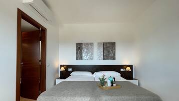 4 slaapkamers, een strijkplank/strijkijzer, gratis wifi, beddengoed
