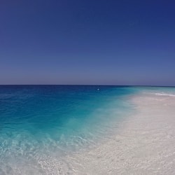On the beach, white sand