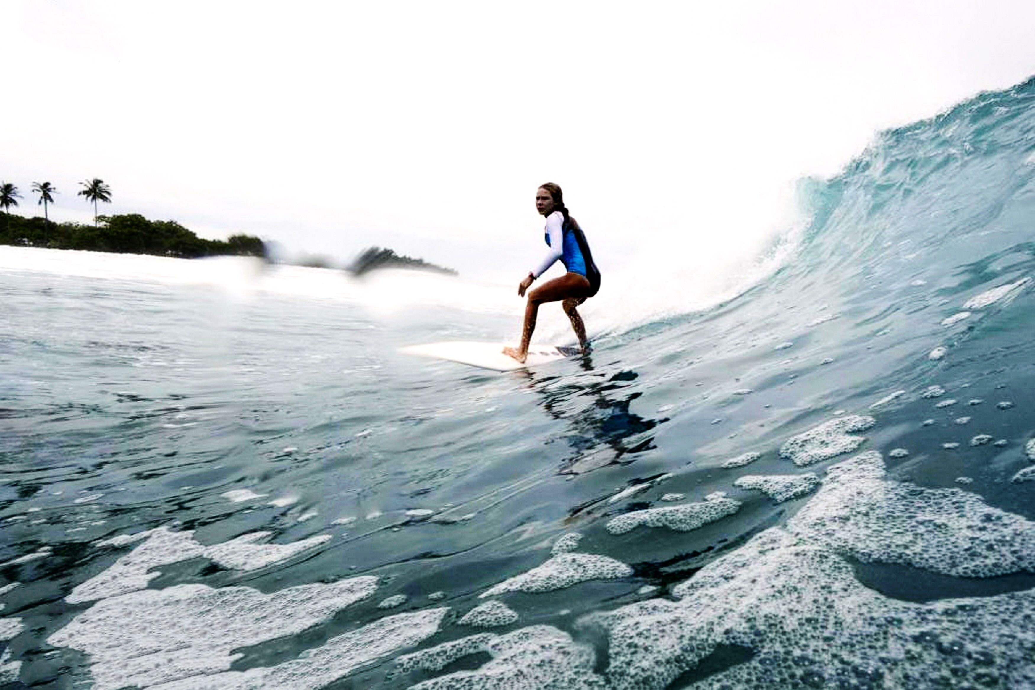 A person surfing a wave.