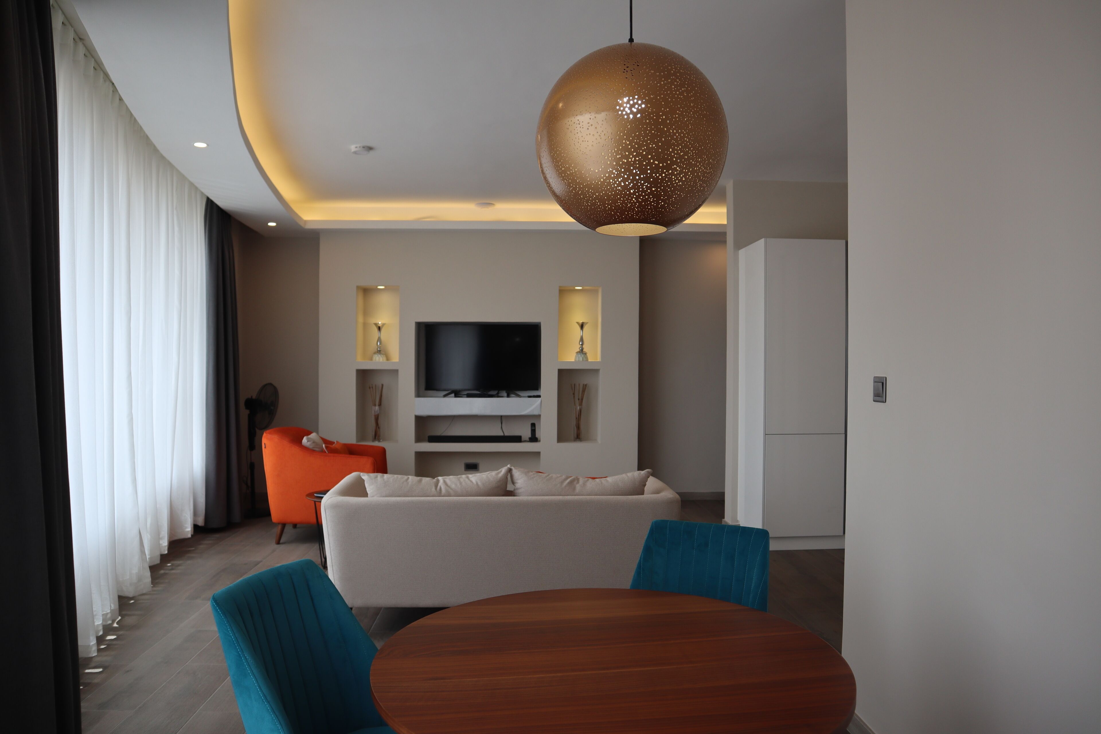 Apartamento superluxo | Área de estar | TV de tela plana