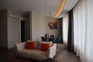 Luxury Apartment | Living area | Flat-screen TV - The Curve by the Park Apartments (Nairobi)