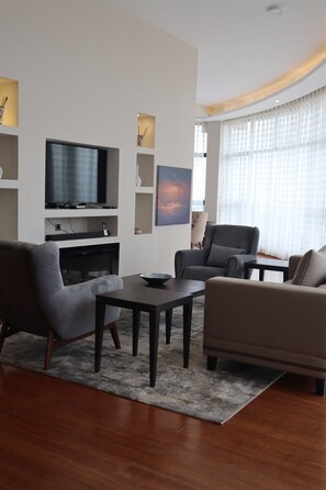 Deluxe Apartment | Living room | Flat-screen TV - The Curve by the Park Apartments (Nairobi)