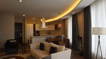 Luxury Apartment | Living area | Flat-screen TV