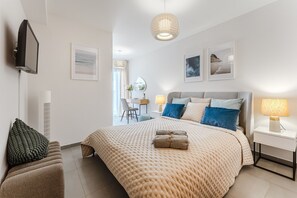 2 dormitorios, tabla de planchar con plancha, Internet y ropa de cama