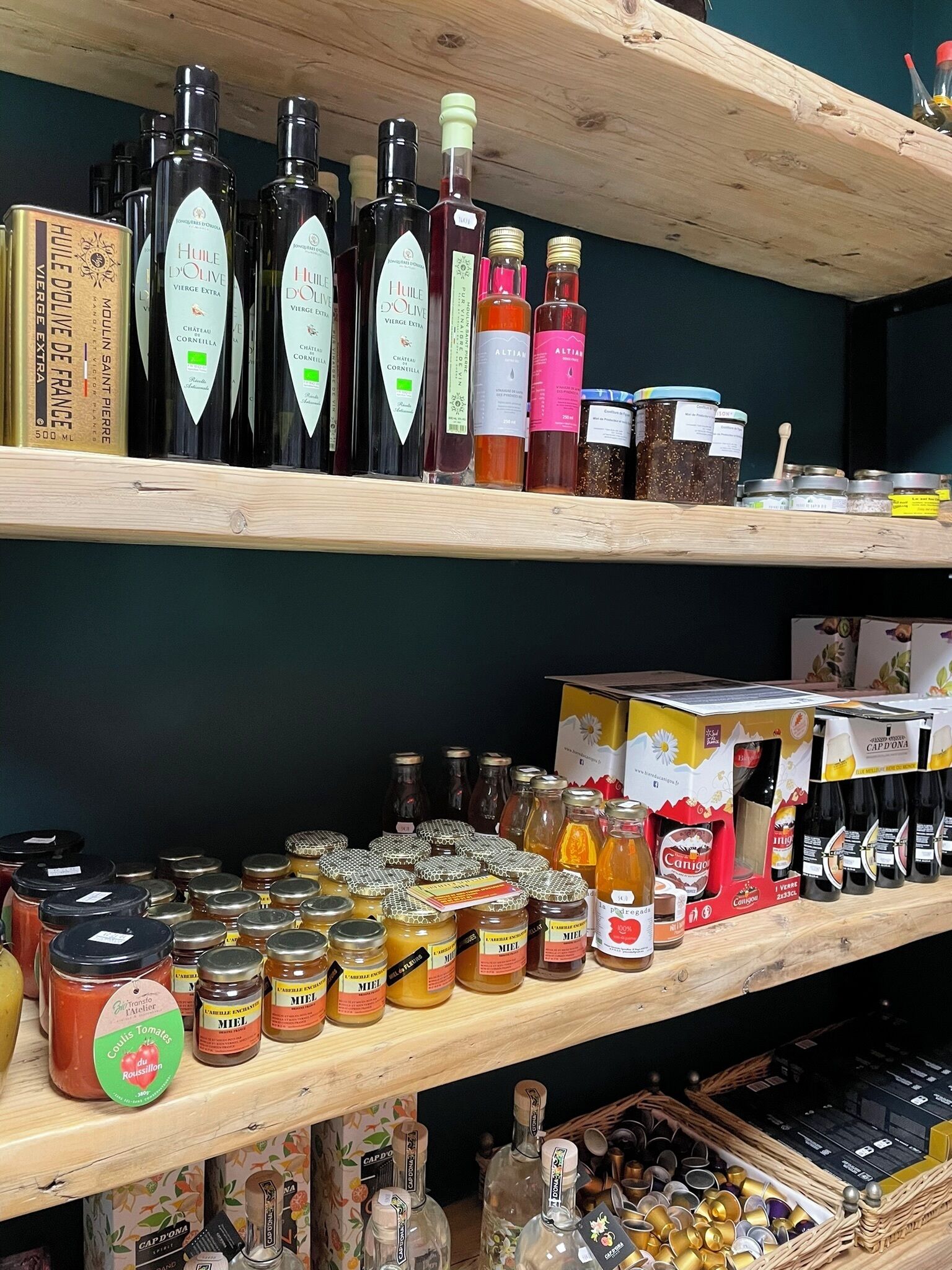 Shelves stocked with various bottles and jars, likely containing food products or condiments.