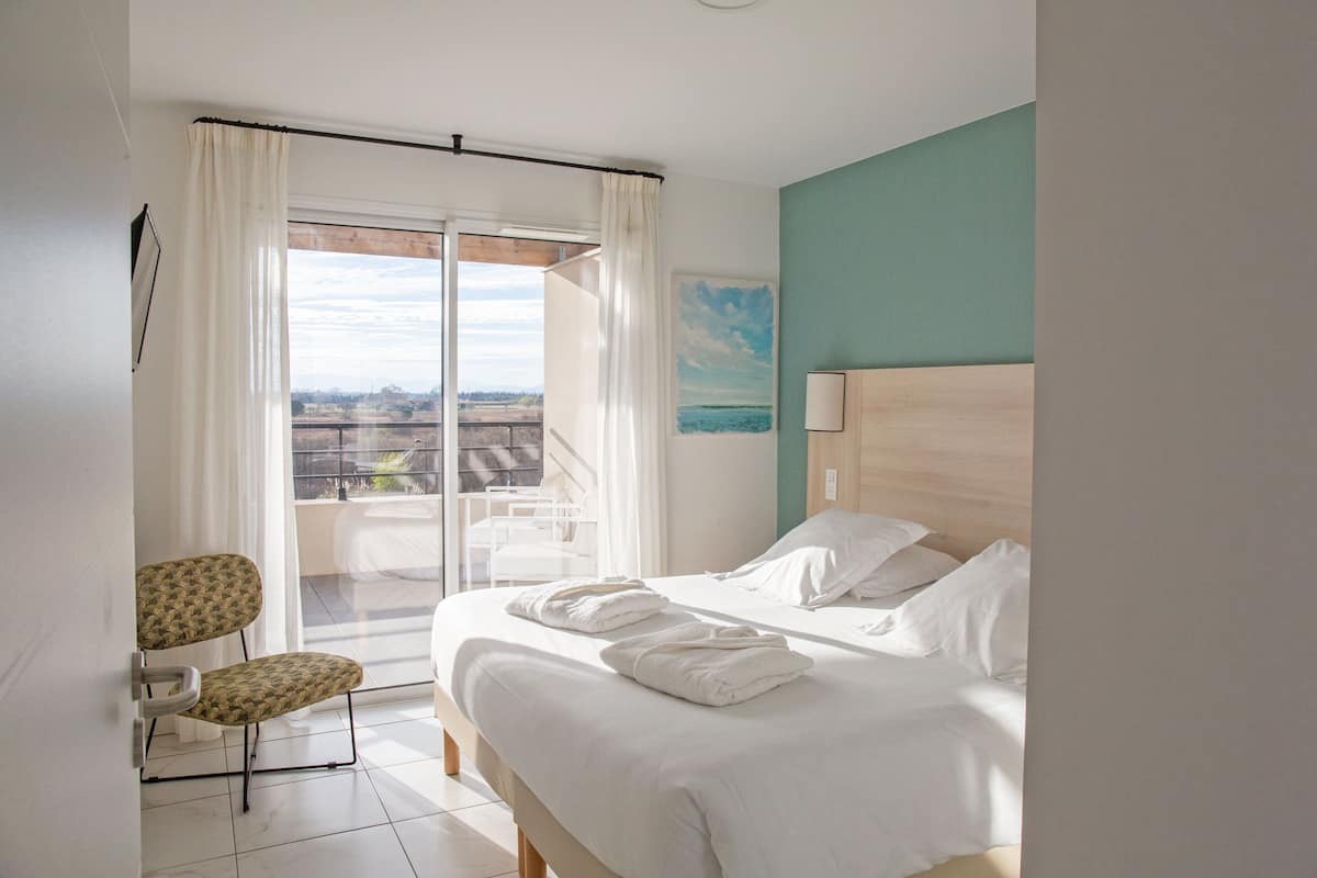 Appartement 4 personnes - 1 chambre + 1 coin nuit - Balcon - Vue Montagne