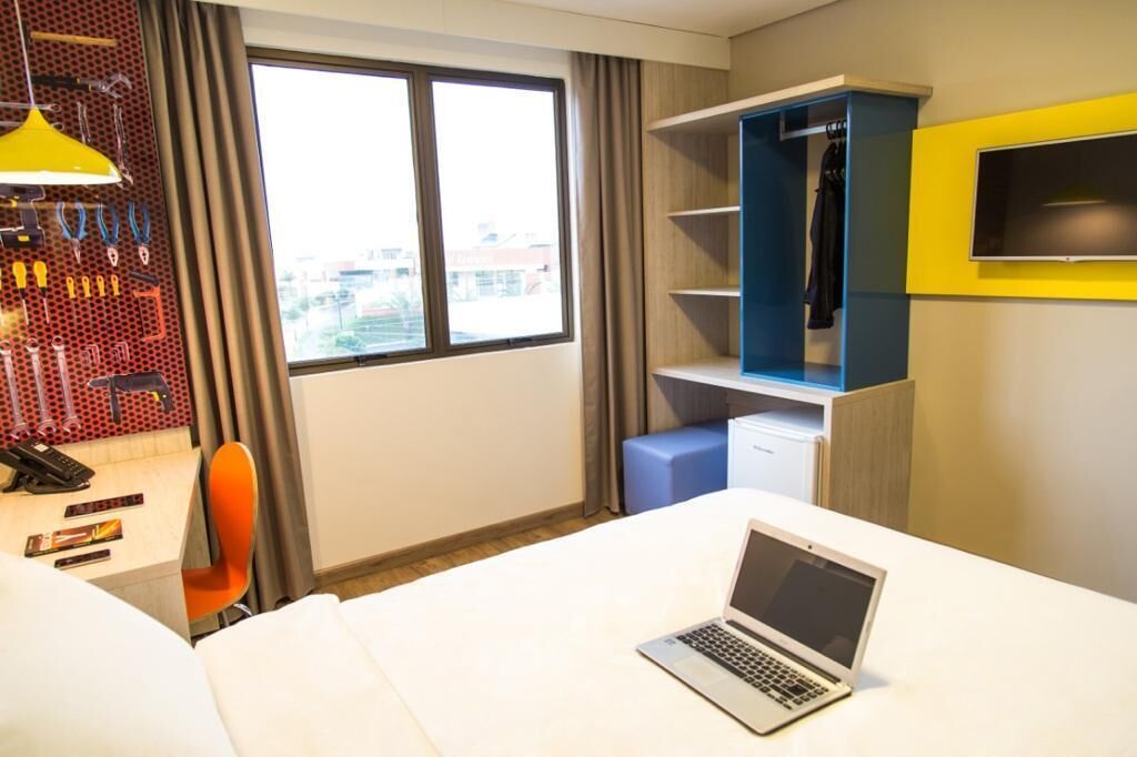 deluxe double room | hypo-allergenic bedding, minibar, individually furnished, desk