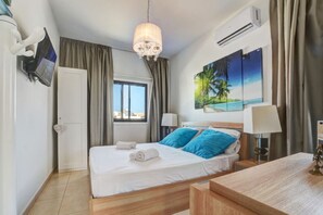 4 bedrooms, desk, iron/ironing board, travel crib