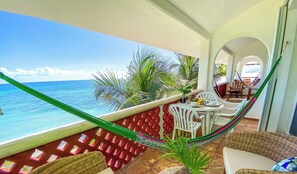 Outdoor dining - Beautiful condo with ocean views, AC and pool! (Akumal)