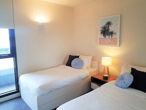 2 bedrooms, desk, iron/ironing board, travel cot