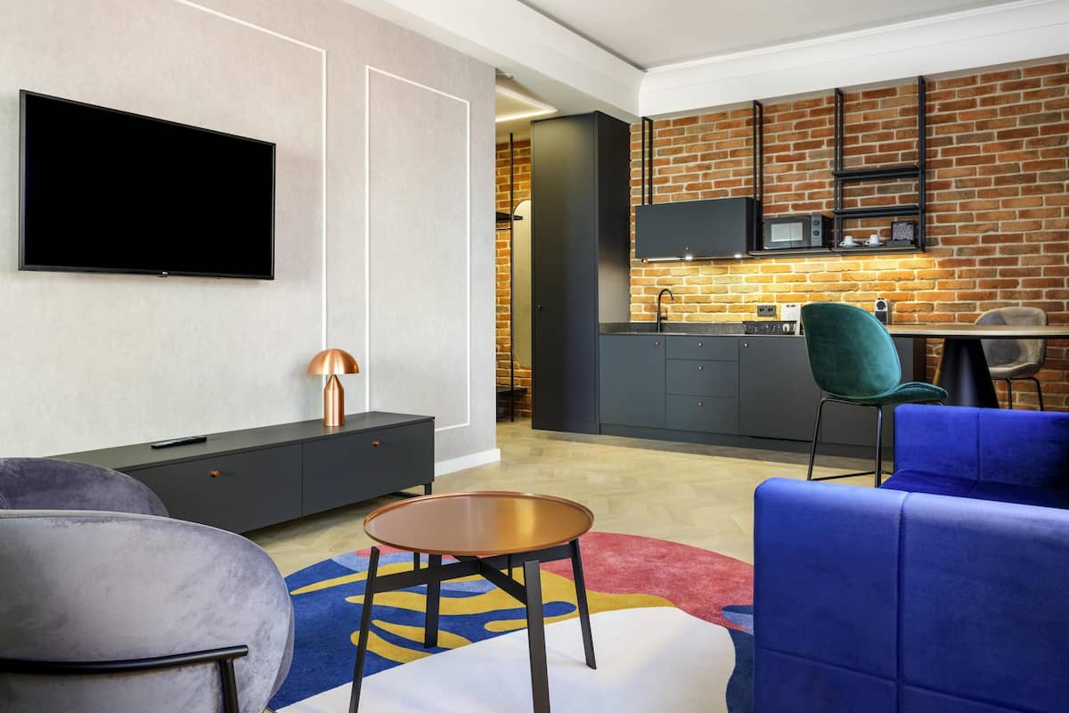 Superior Suite, 1 King Bed with Sofa bed | 1 bedroom, in-room safe, individually furnished, desk