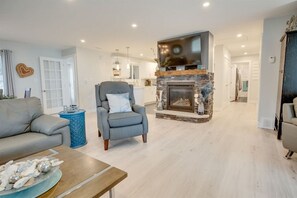 Smart TV, fireplace, Netflix, books