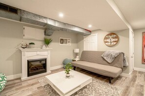 Smart TV, fireplace, books