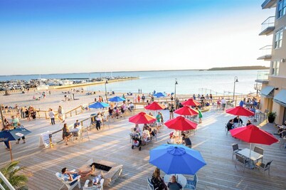 Luxury water-view condo with high-end finishes and beach toys included!