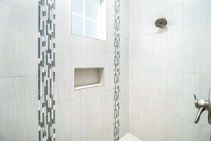 Combined shower/tub, hair dryer, towels, soap
