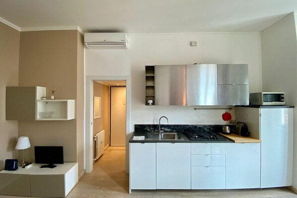 Microondas, placa de cocina