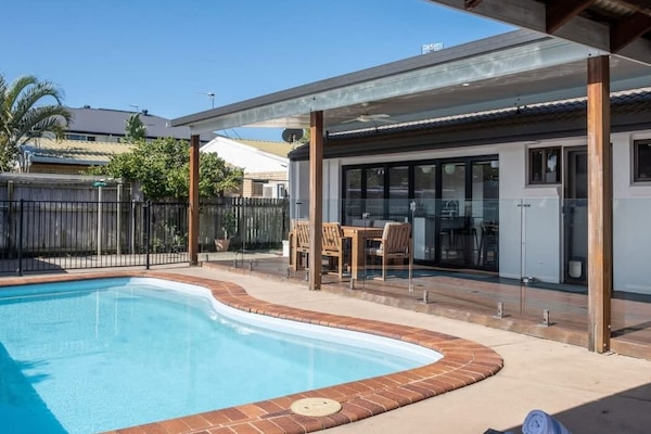 Large outdoor space with refreshing pool.