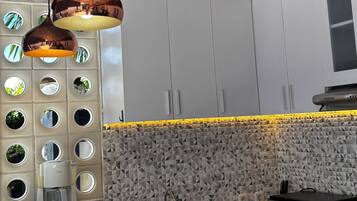 Fridge, coffee/tea maker, electric kettle, toaster