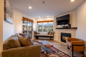 TV, fireplace - Heart of the Village. Newly renovated , modern décor throughout, Central AC just installed 2024 (Whistler)