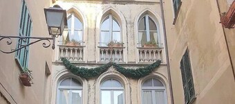 Villa Malvina C: Un accogliente appartamento che fa parte di una antica palazzina storica.