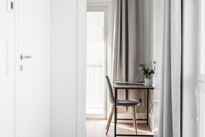 1 bedroom, laptop workspace, blackout curtains, soundproofing