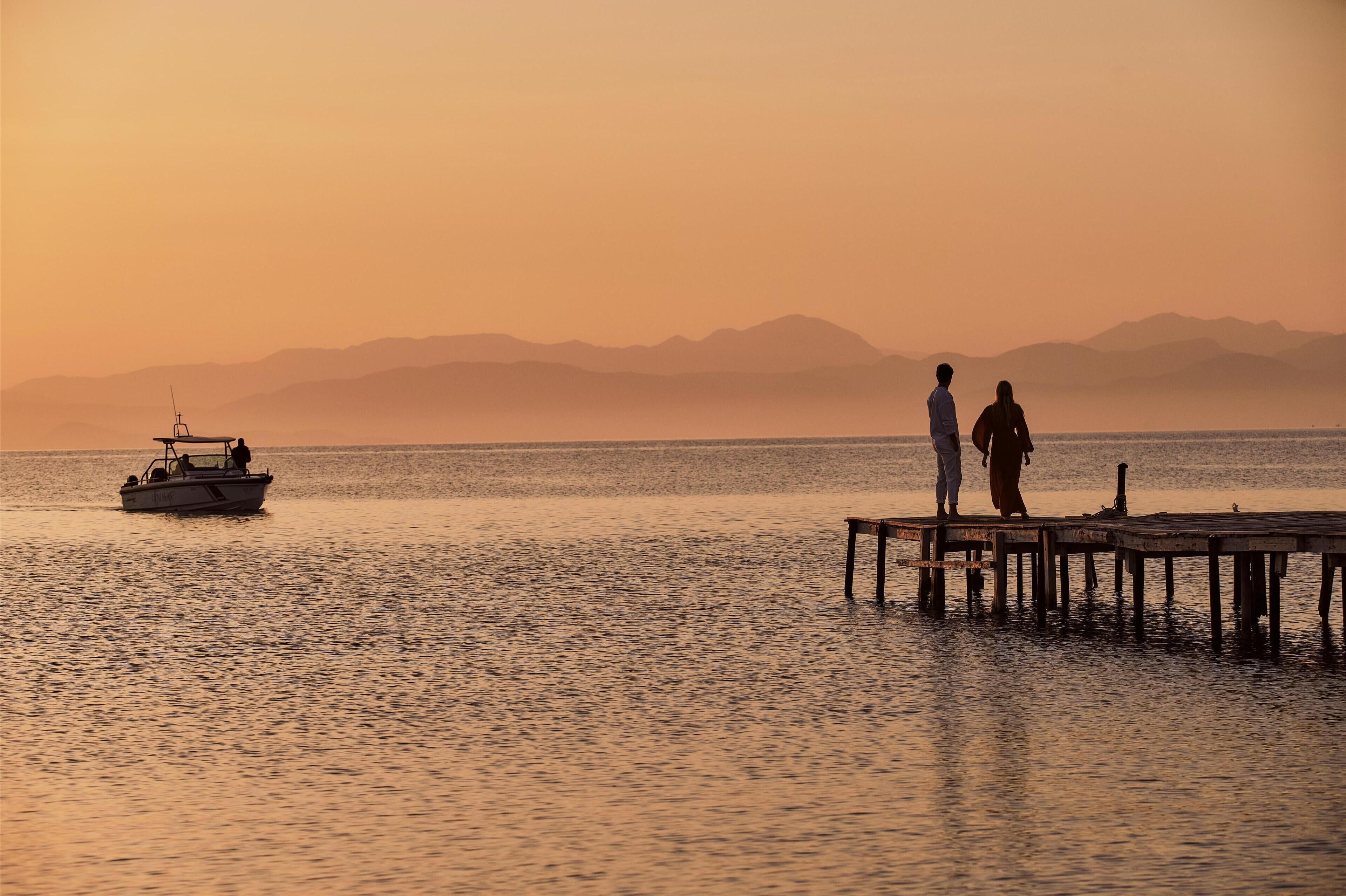 on the beach, white sand, sun-loungers, beach umbrellas