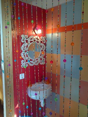 Combined shower/bathtub, hair dryer, towels, toilet paper