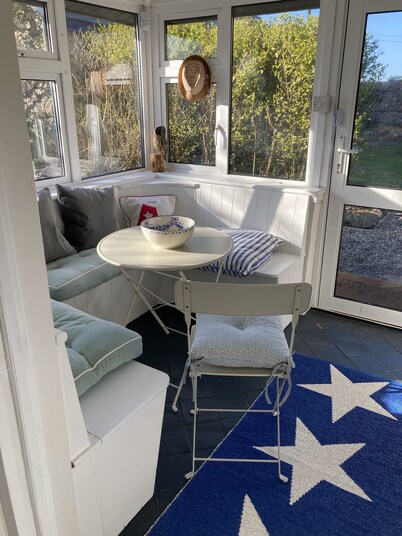 
 "Fisherman's Cottage" - Coastal Retreat at Carne Beach with Private Garden.