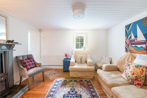 TV, fireplace, DVD player, ping pong - 
 "Fisherman's Cottage" - Coastal Retreat at Carne Beach with Private Garden. (Carne Beach)