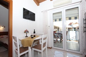 Apartment, 1 Bedroom, Smoking, Balcony | Living area | 40-inch flat-screen TV with satellite channels, TV