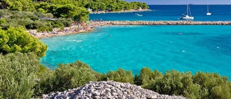 On the beach, sun loungers
